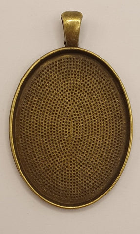 Bronze plated oval Pendant 4x3cm